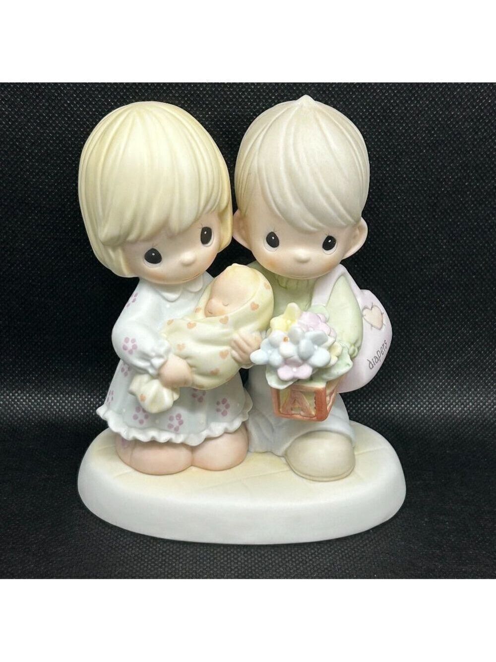Precious Moments “Blessed With a Miracle" figurine